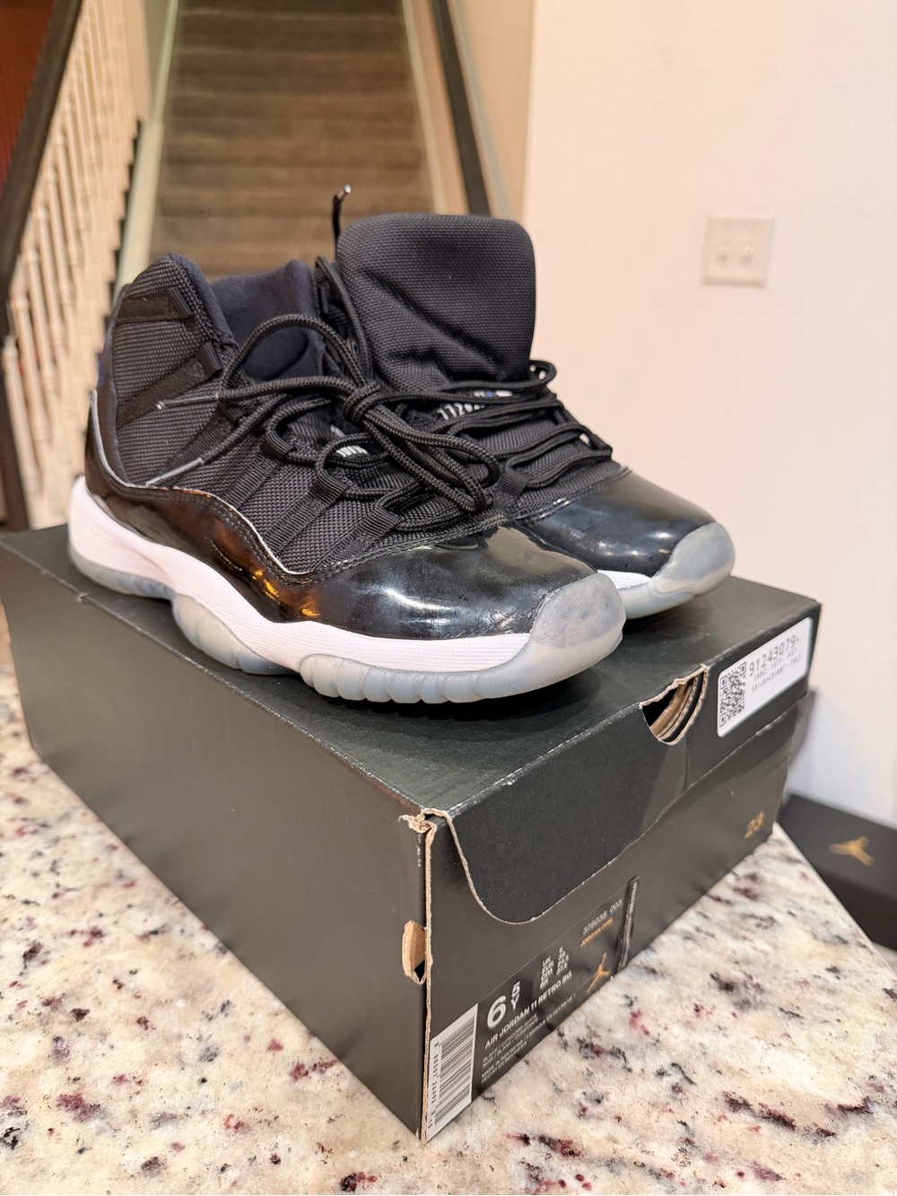 Jordan Kids Black and White High-Top Sneakers